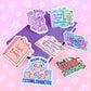 Conjunto de varias pegatinas de la temática de libros de Turtle's Soup con un libro lila de fondo.