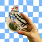 Espejo de bolsillo abierto con mensaje interior «You are one fine bird»