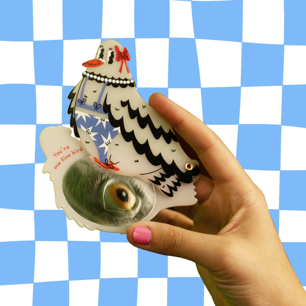 Espejo de bolsillo abierto con mensaje interior «You are one fine bird»