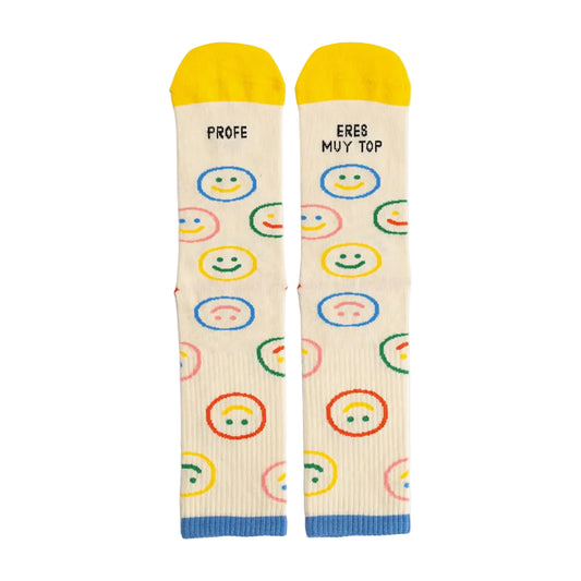 Calcetines con caritas sonrientes y el mensaje "Profe eres muy top"