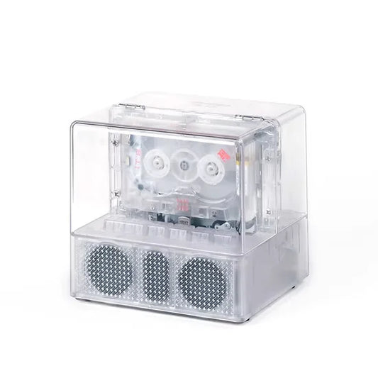 Caja transparente con reproductor de cintas de cassette, altavoz bluetooth y cinta transmisora de Ninm Lab