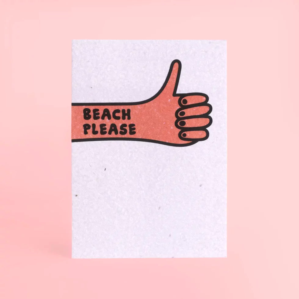 postal con semillas dentro de la marca resetea con un puño cerrado levantando el pulgar con el texto Beach please,