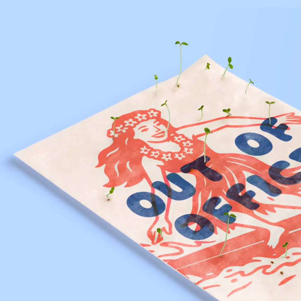 detalle de la postal con semillas dentro de la marca resetea con una chica haciendo surf con un vestido de hawaiana y flores dibujada en color rojo con el texto Out Of Office en color azul con brotes saliendo de ella