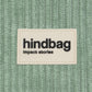 Tejido de pana verde agua con la etiqueta de marca de Hindbag