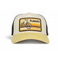 Gorra beige y amarillo crema con parche bordado del barrio de Ruzafa con una bicicleta
