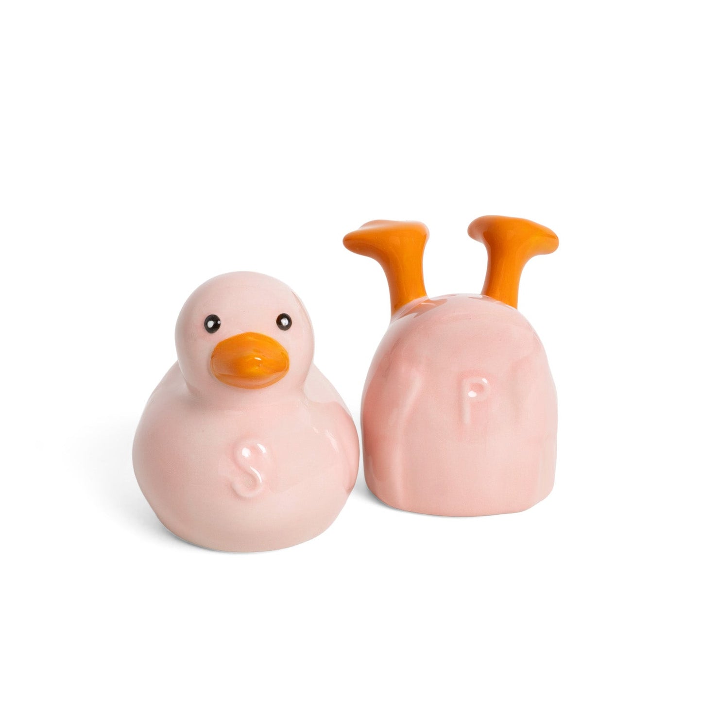 Salero y pimentero de cerámica con forma de patos rosas, uno nadando y otro buceando con las patas para arriba