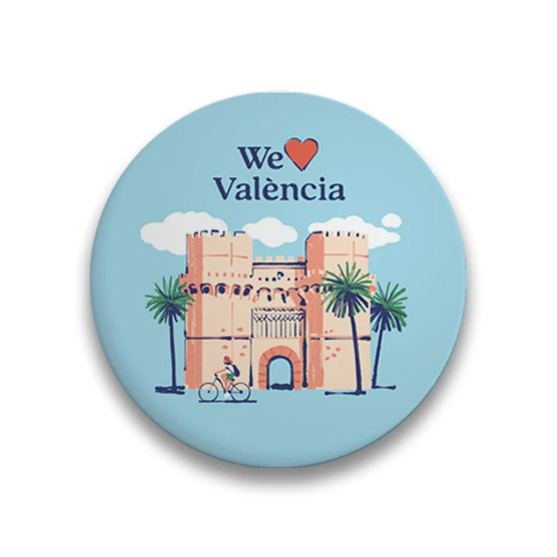 Imán redondo souvenir de Valencia con la ilustración de las Torres de Serrano