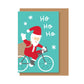 tarjeta de Navidad con ilustración de Papá Noel en bicicleta de Elisa Talens y sobre craft