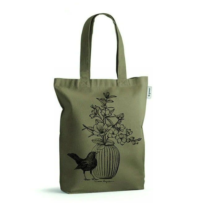 Tote bag verde oscuro con ilustración de laura Agustí de un jarrón con un mirlo