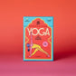 Caja con cartas ilustradas de diferentes posturas de yoga y manual de uso