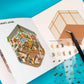 Libro de pegatinas Viaje a Japón abierto con escenas japonesas en 3D