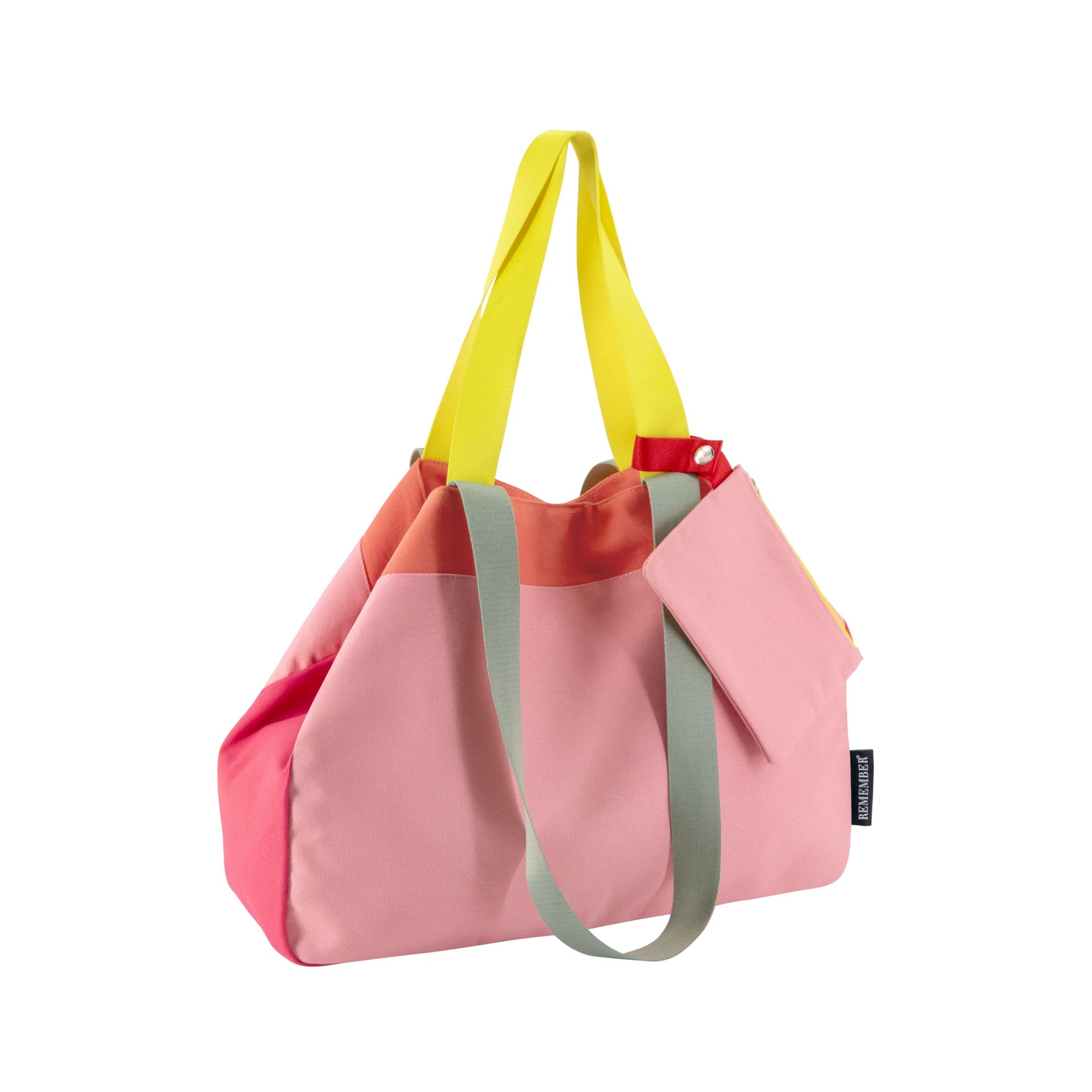 bolsa de lona rosi en color rosa con las asas amarillas, con forma triangular y una bolsita exterior anclada a una de las asas