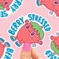 Pegatina de una fresa tumbada llorando y el mensaje Berry Stressed