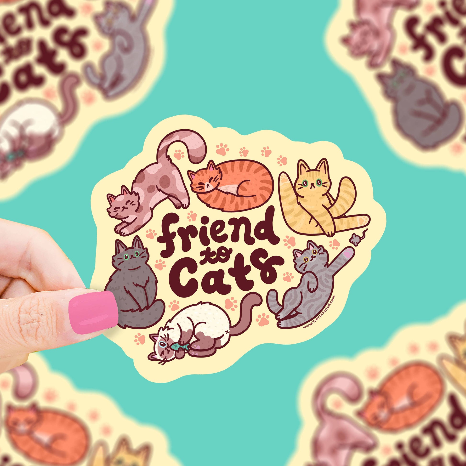 Pegatina troquelada con 6 gatos en diferentes posiciones alrededor del mensaje "Friend to cats"