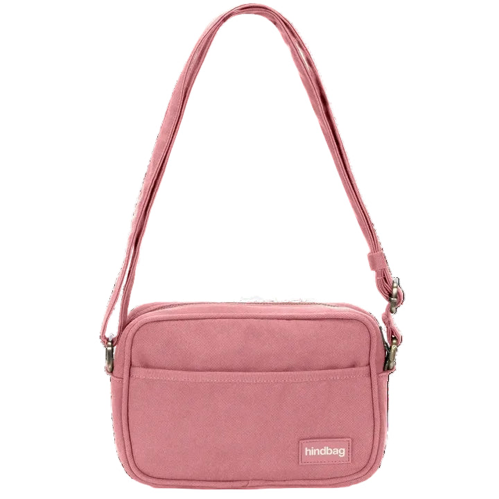 Vista frontal de la bandolera rosa Nino de Hindbag, con bolsillo exterior abierto, cierre superior de cremallera y correa ajustable.