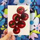 Postal con dibujo de rama de tomates de Laura Ortiz