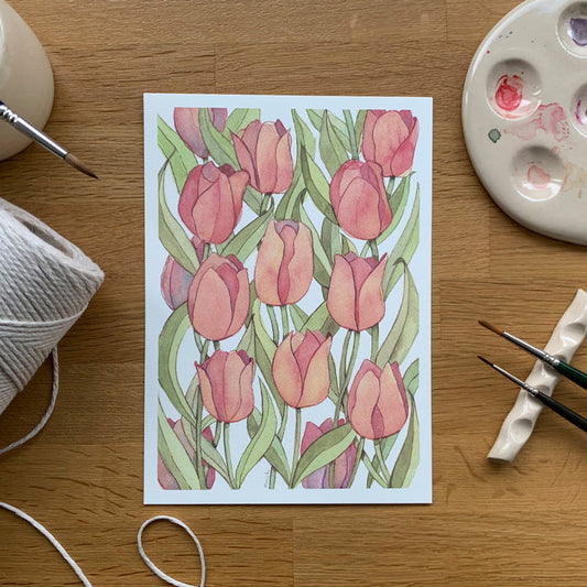 Ilustración de tulipanes naranjas en acuarela dibujada por Marialu Gili