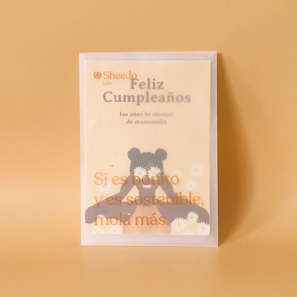 Tarjeta postal ecológica con semillas Feliz Cumpleaños de Sheedo en un sobre traslúcido de papel con mensaje