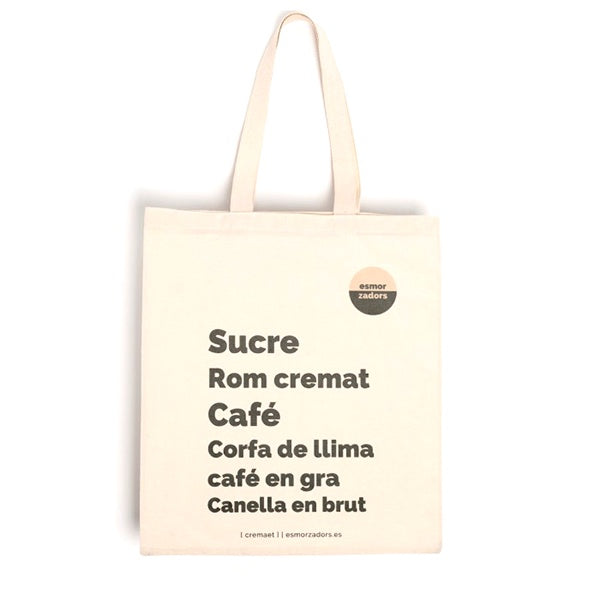 Tote bag en color crudo con los ingredientes del cremaet en valenciano