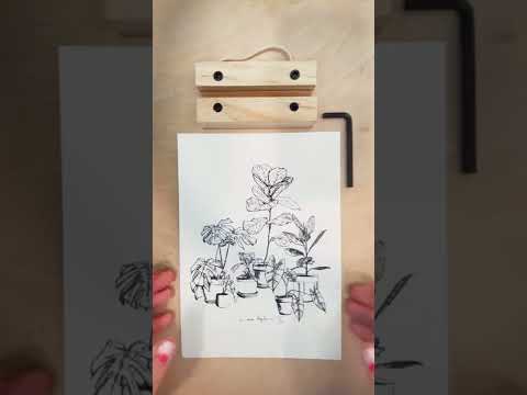 Vídeo tutorial en el que se enseña cómo se monta el colgador de madera para láminas