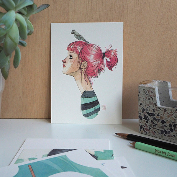 Ilustración de pájaros en la cabeza en el pack rojo de postales de la ilustradora Esther Gili