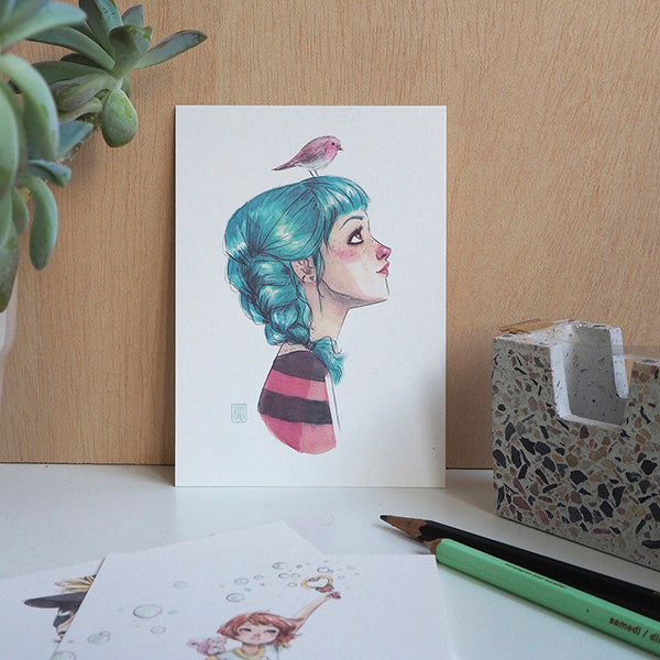 Ilustración de pájaros en la cabeza en el pack rojo de postales de la ilustradora Esther Gili