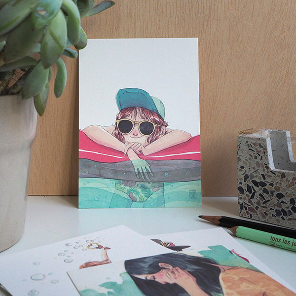 ilustración "Vivir en el agua" en el pack rojo de postales de la ilustradora Esther Gili